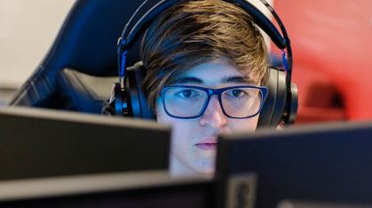 student-with-headphones.png